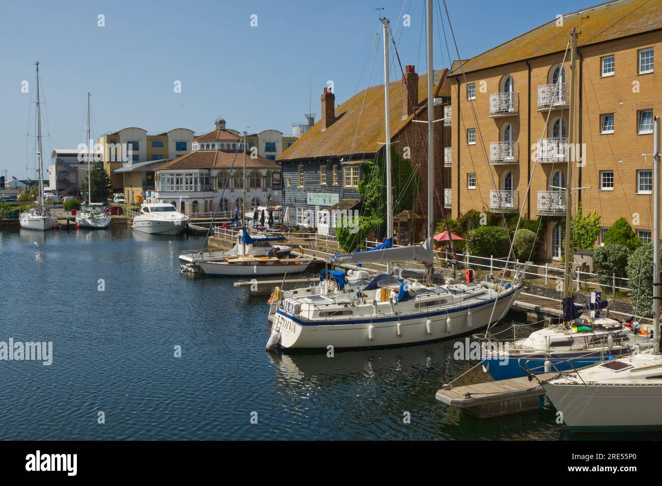 Boat moorings and housing at Brighton Marina, East Sussex, England. Stock Photo