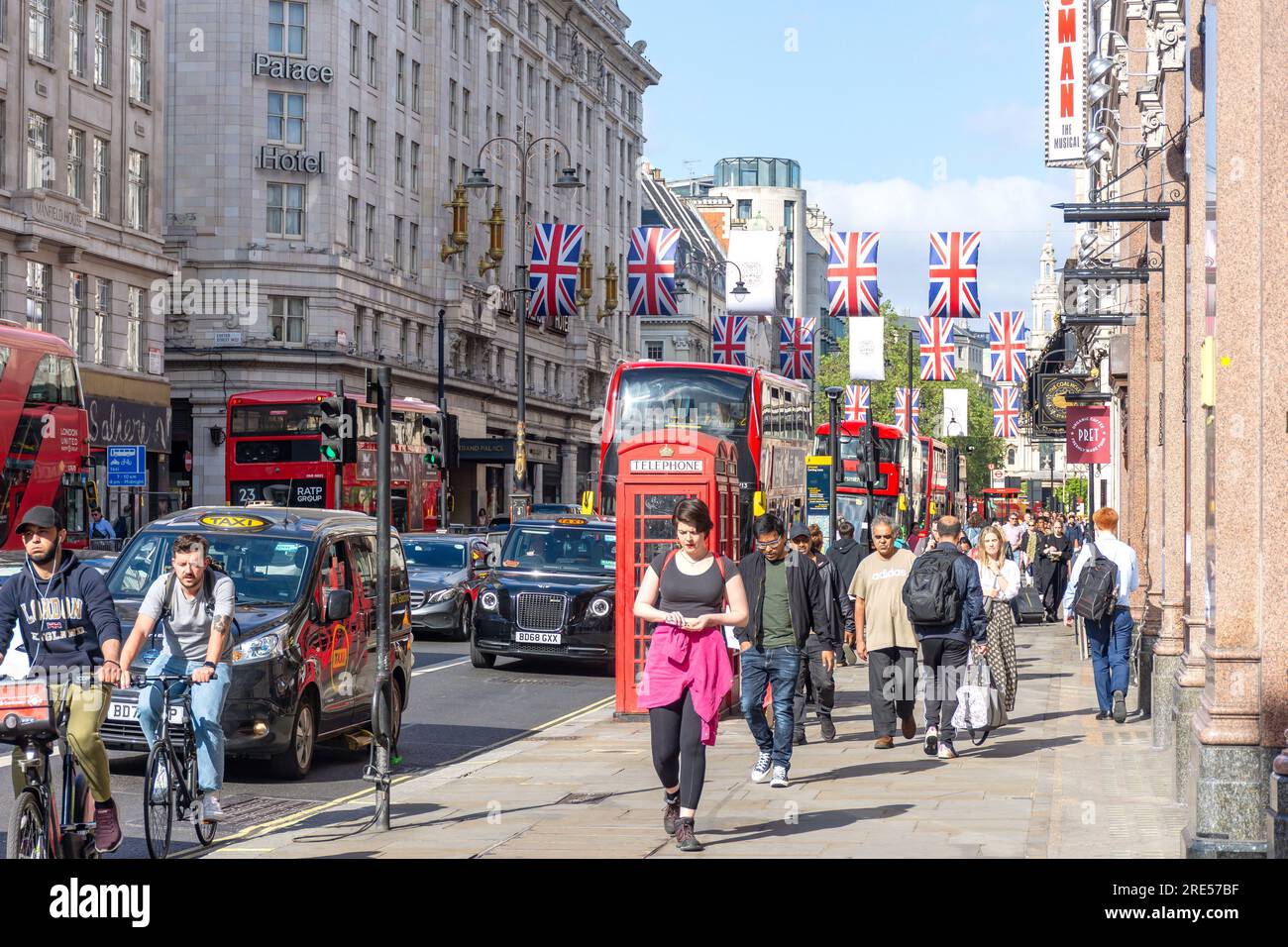 Traffic and pedestrians on The Strand, City of Westminster, Greater London, England, United Kingdom Stock Photo