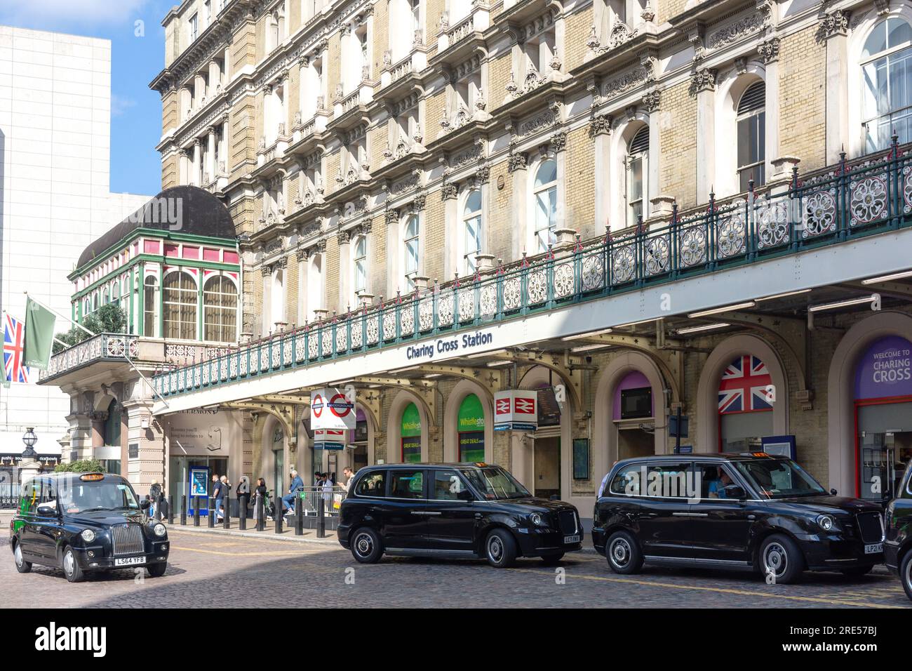 Black cabs outside Charing Cross Railway Station, The Strand, Charing Cross, City of Westminster, Greater London, England, United Kingdom Stock Photo