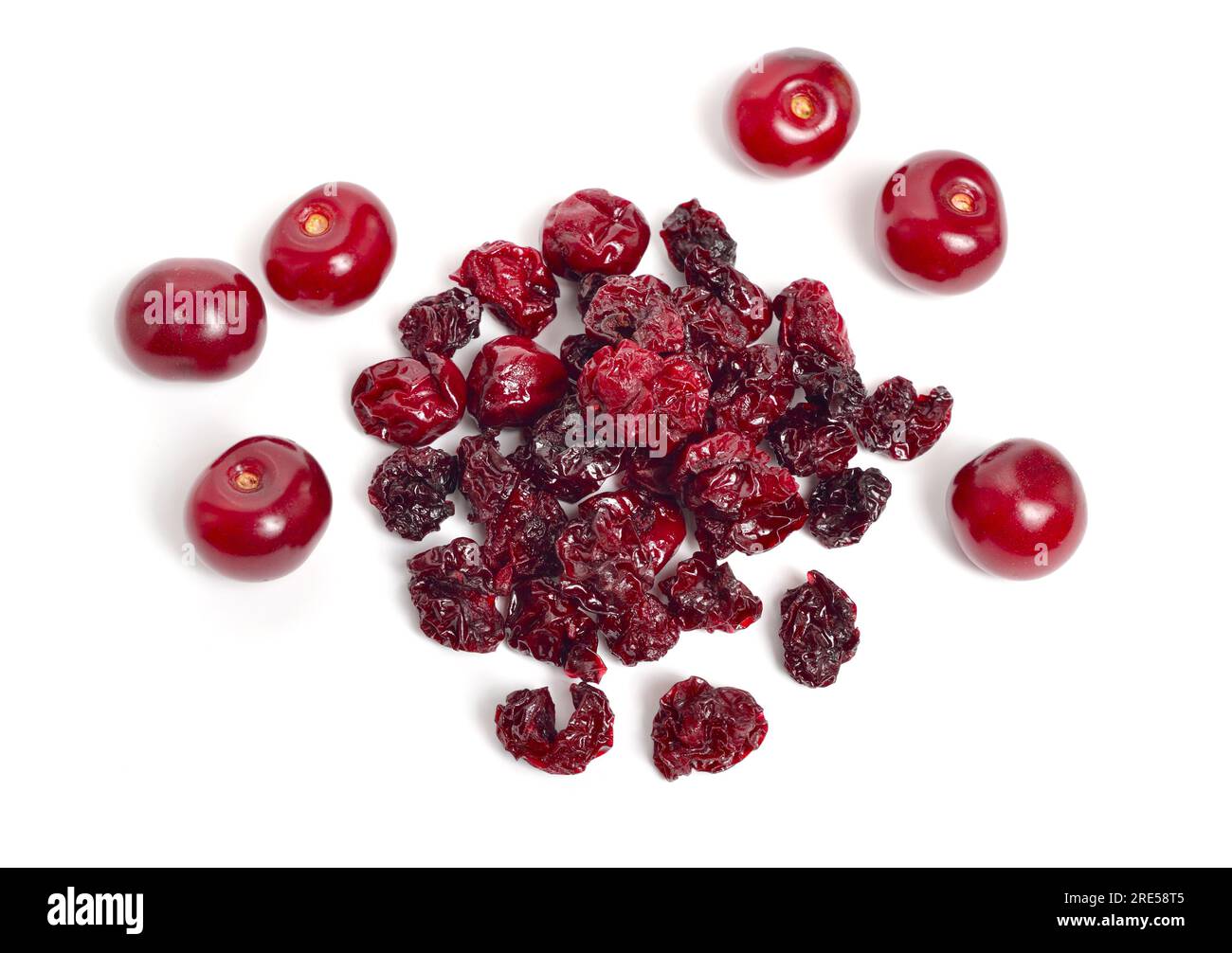 Dried cherry heap isolated on white background Stock Photo Alamy