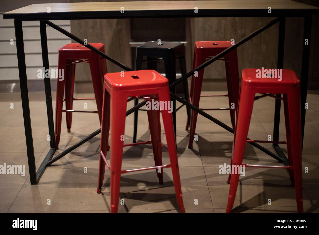 Chairs in restaurant. Bar seating. Red chairs. Interior details Stock