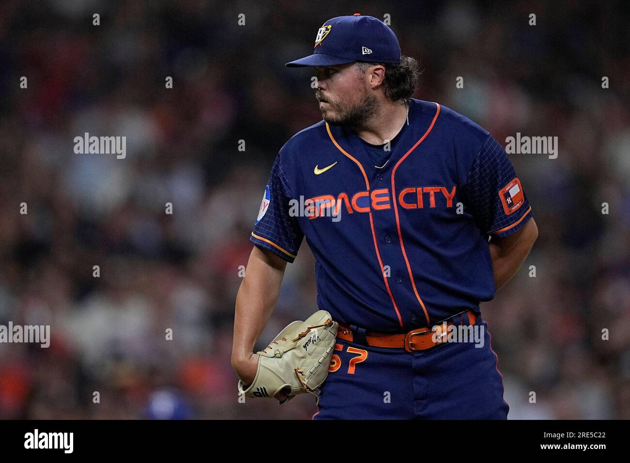 Houston Astros relief pitcher Parker Mushinski looks in at the plate during  the fifth inning of a baseball game against the Texas Rangers, Monday, July  24, 2023, in Houston. (AP Photo/Kevin M.