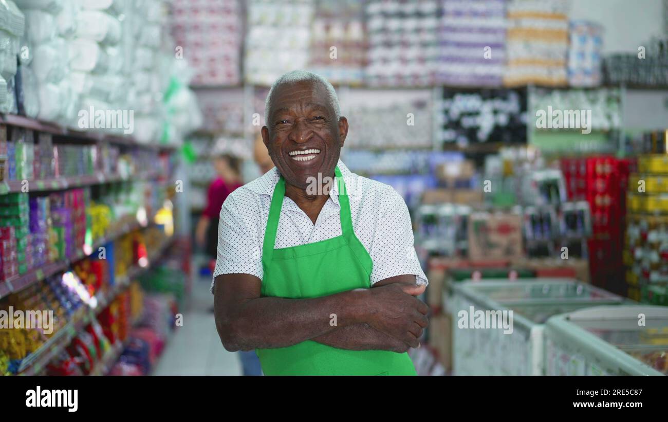 Senior African American Grocery Store Employee Smiling Joyfully