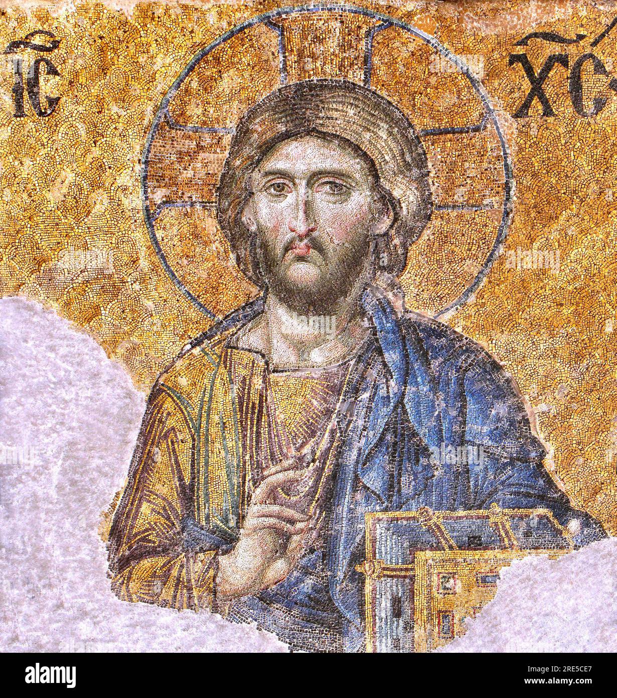Title: Byzantine Mosaic Christ Pantocrator in Hagia Sophia Artist: Not specified (Byzantine craftsmen and artists) Date: 1261 (Most likely the period of the mosaic's creation after the restoration of Hagia Sophia) Dimensions: Not specified Medium: Mosaic (Tiles) Location: Hagia Sophia, Istanbul, Turkey Stock Photo