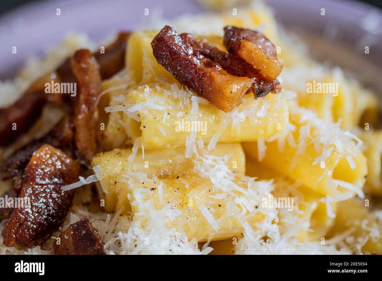 detail of a plate of pasta carbonara. Typical dish of Italian and Roman