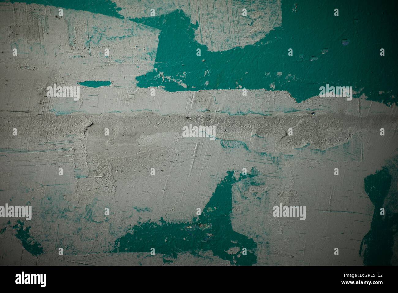 Repairing wall. White spots on wall. Paint application. Texture of