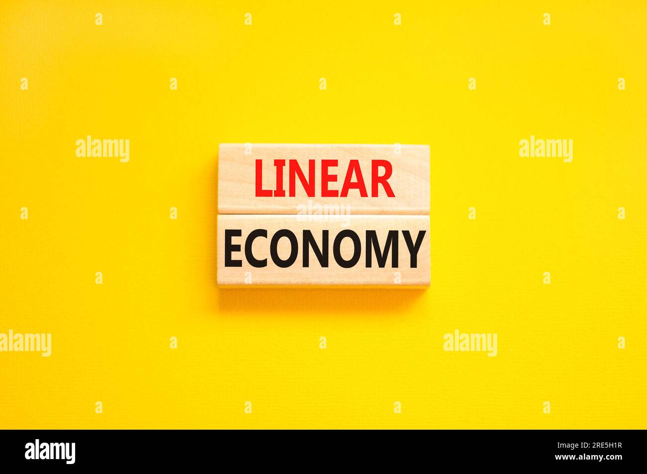 Linear economy symbol. Concept words Linear economy on beautiful wooden