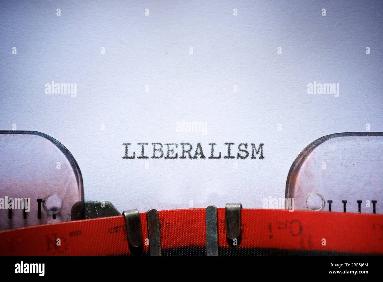 Liberalism word written with a typewriter. Stock Photo