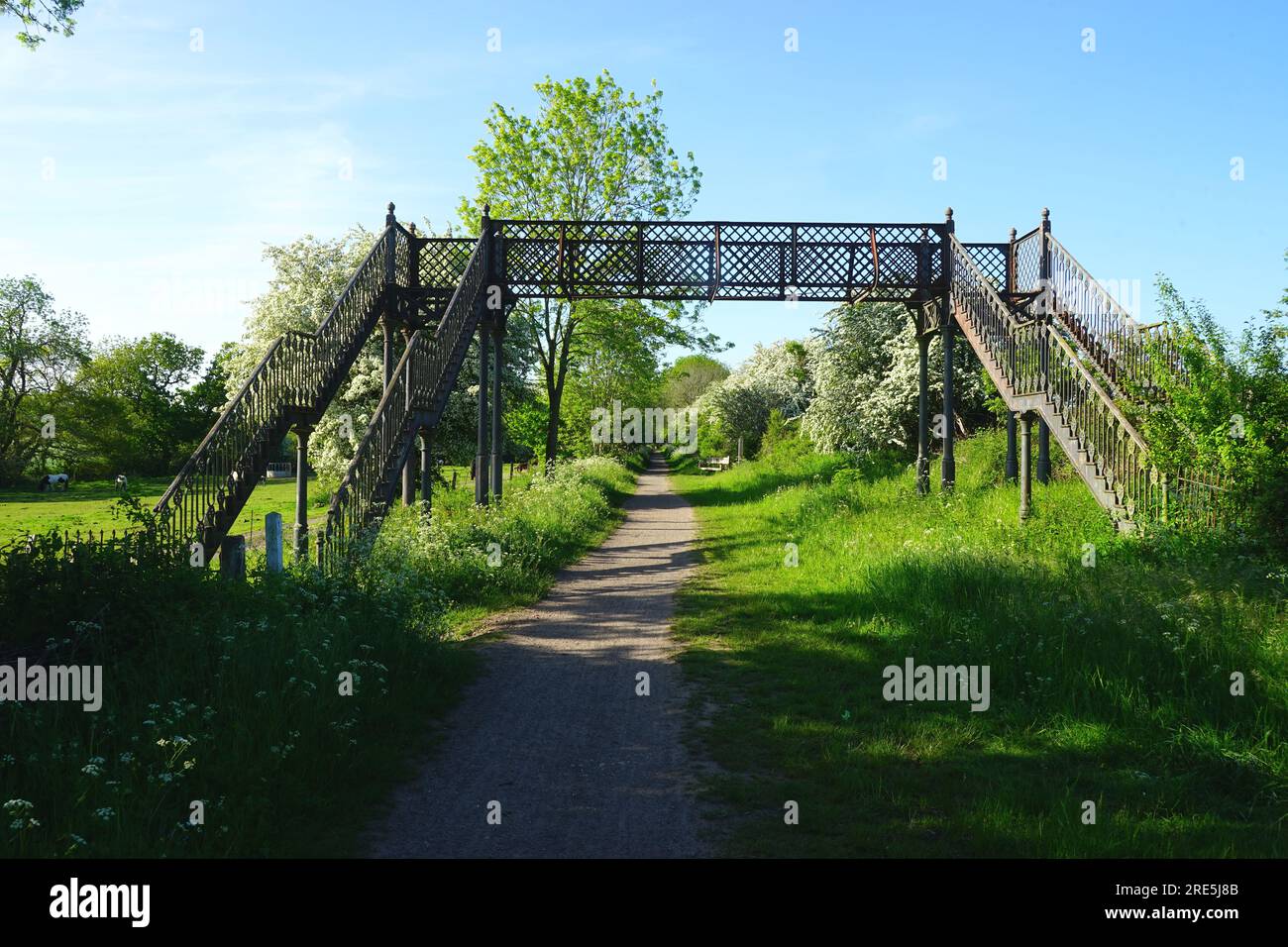 The disused Maidwell Footbridge at the beginning of June Stock Photo