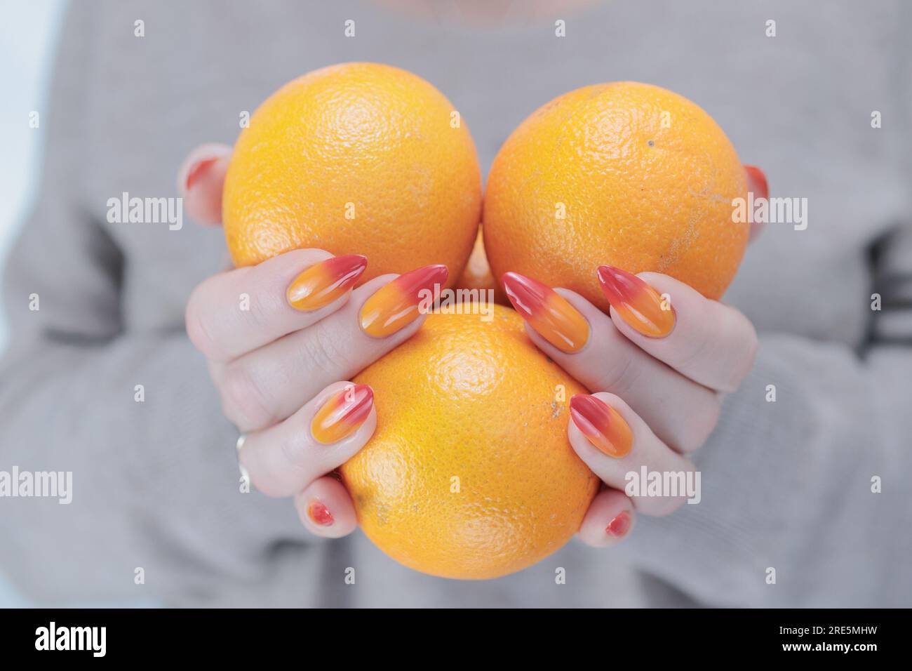 Hand holding apple manicure hi-res stock photography and images - Alamy