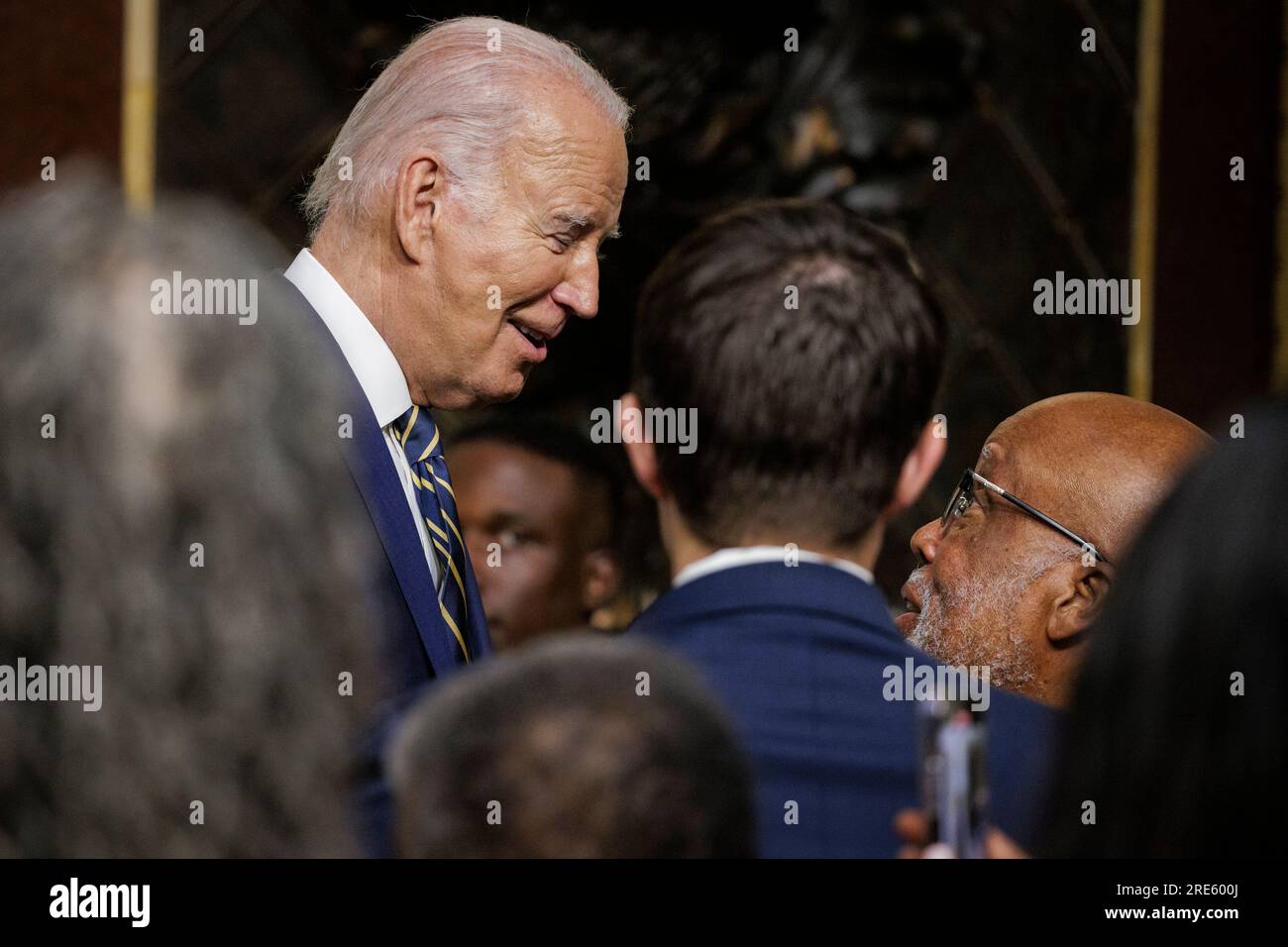 United States President Joe Biden speaks with US Representative Bennie