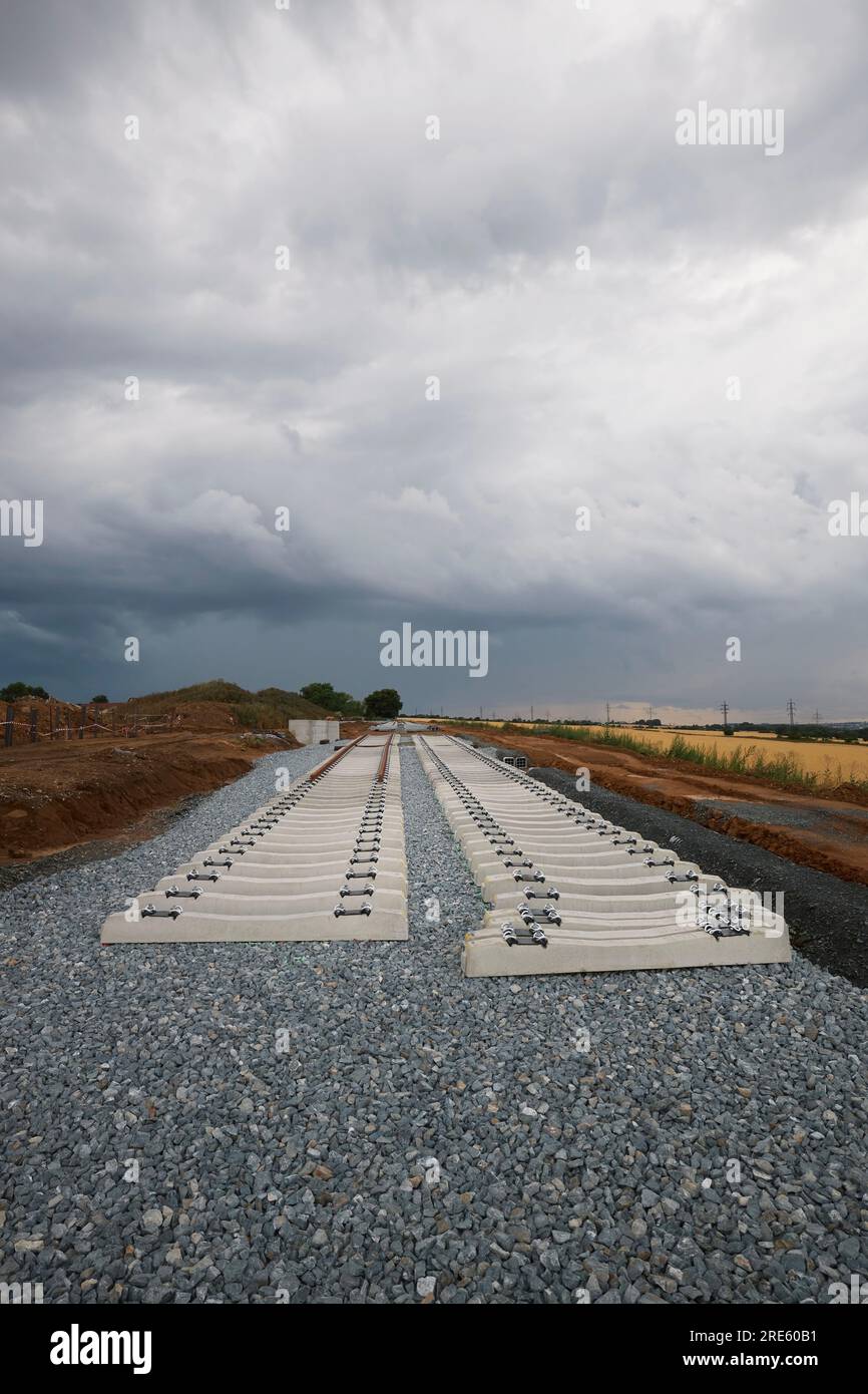 Construction site of railroad track. Building of new train or tram connection. Themes building, development and rail transportation. Stock Photo