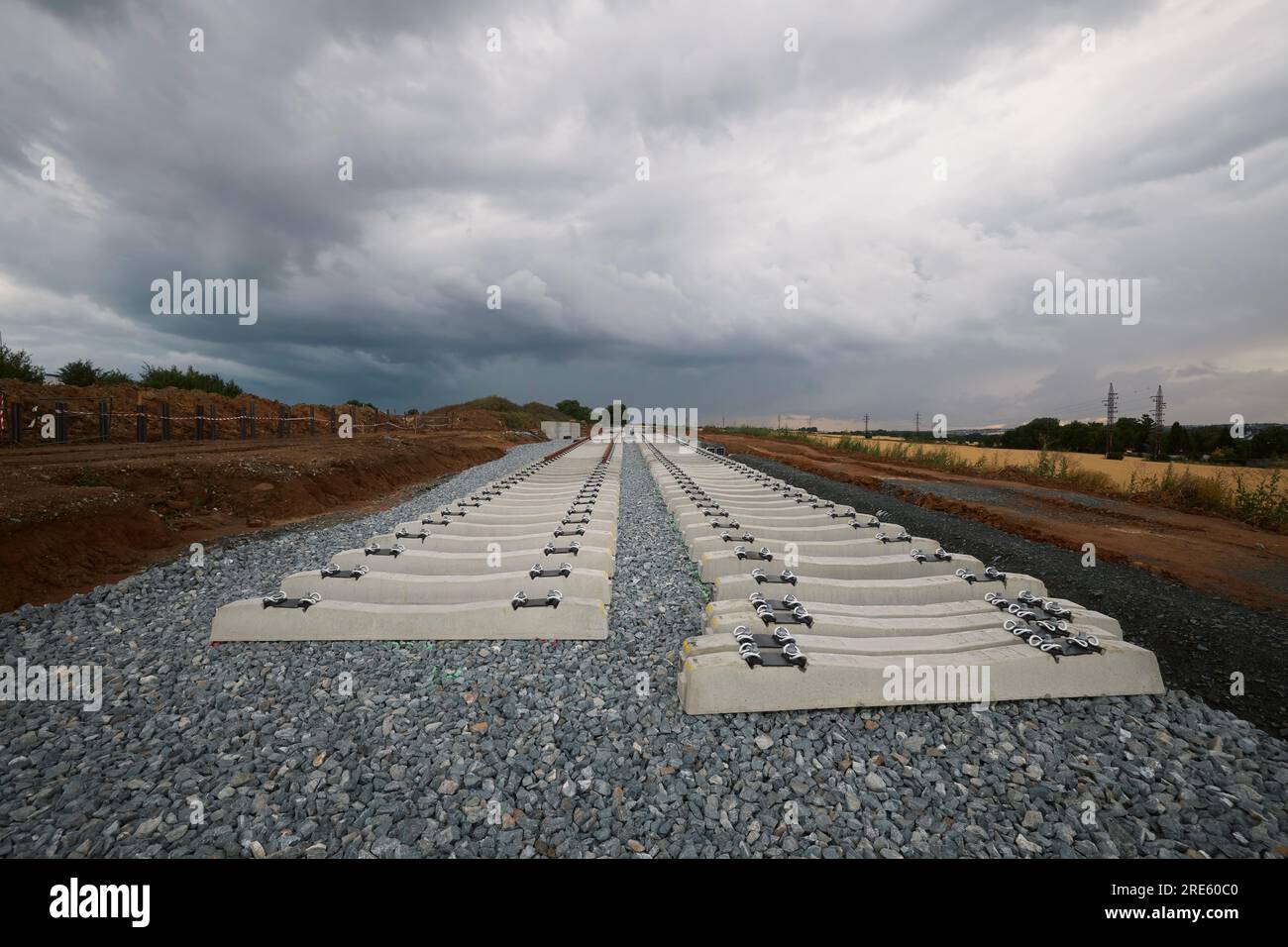 Construction site of railroad track. Building of new train or tram connection. Themes building, development and rail transportation. Stock Photo