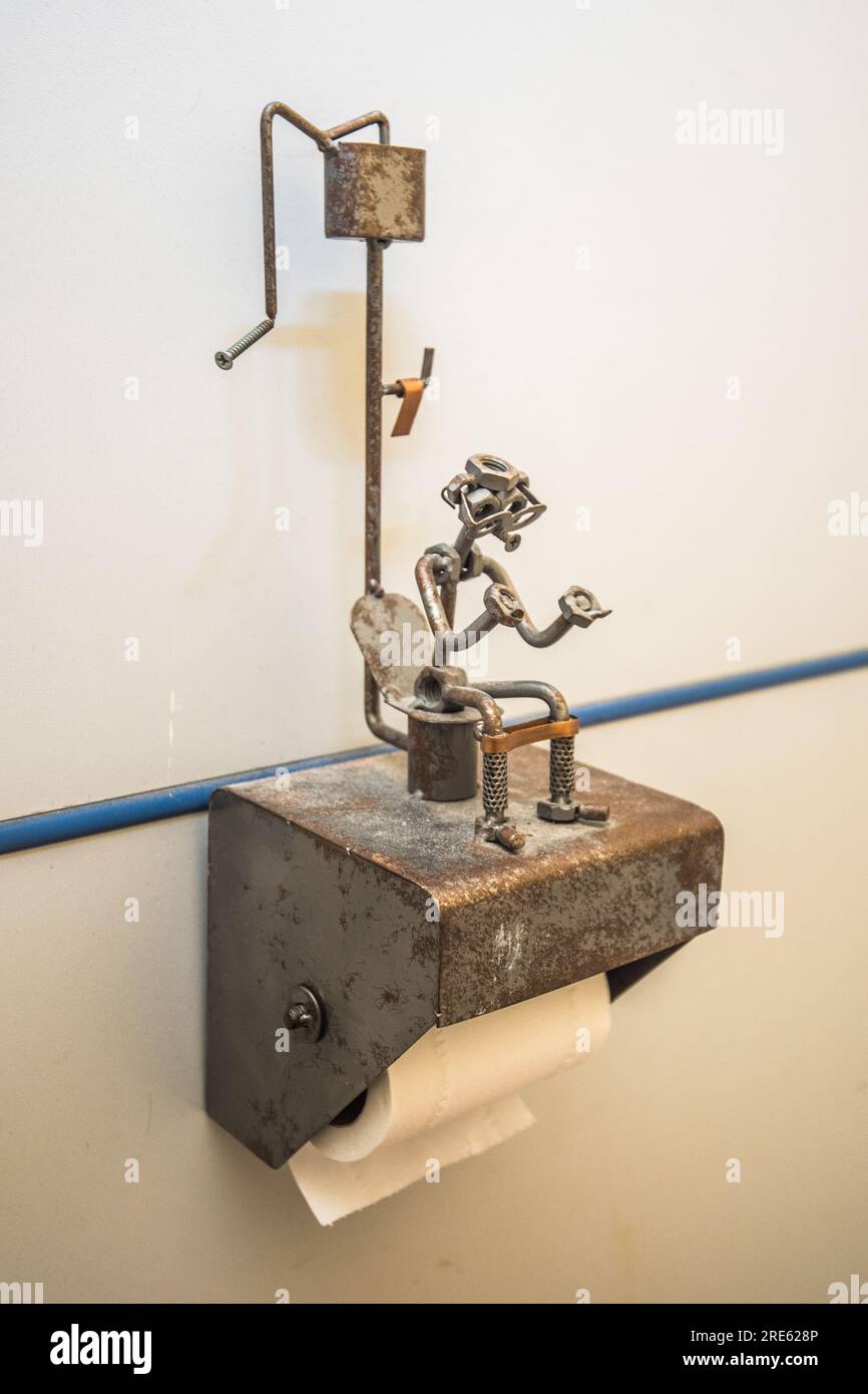 Novelty figure crafted from metal pieces and remembering high level