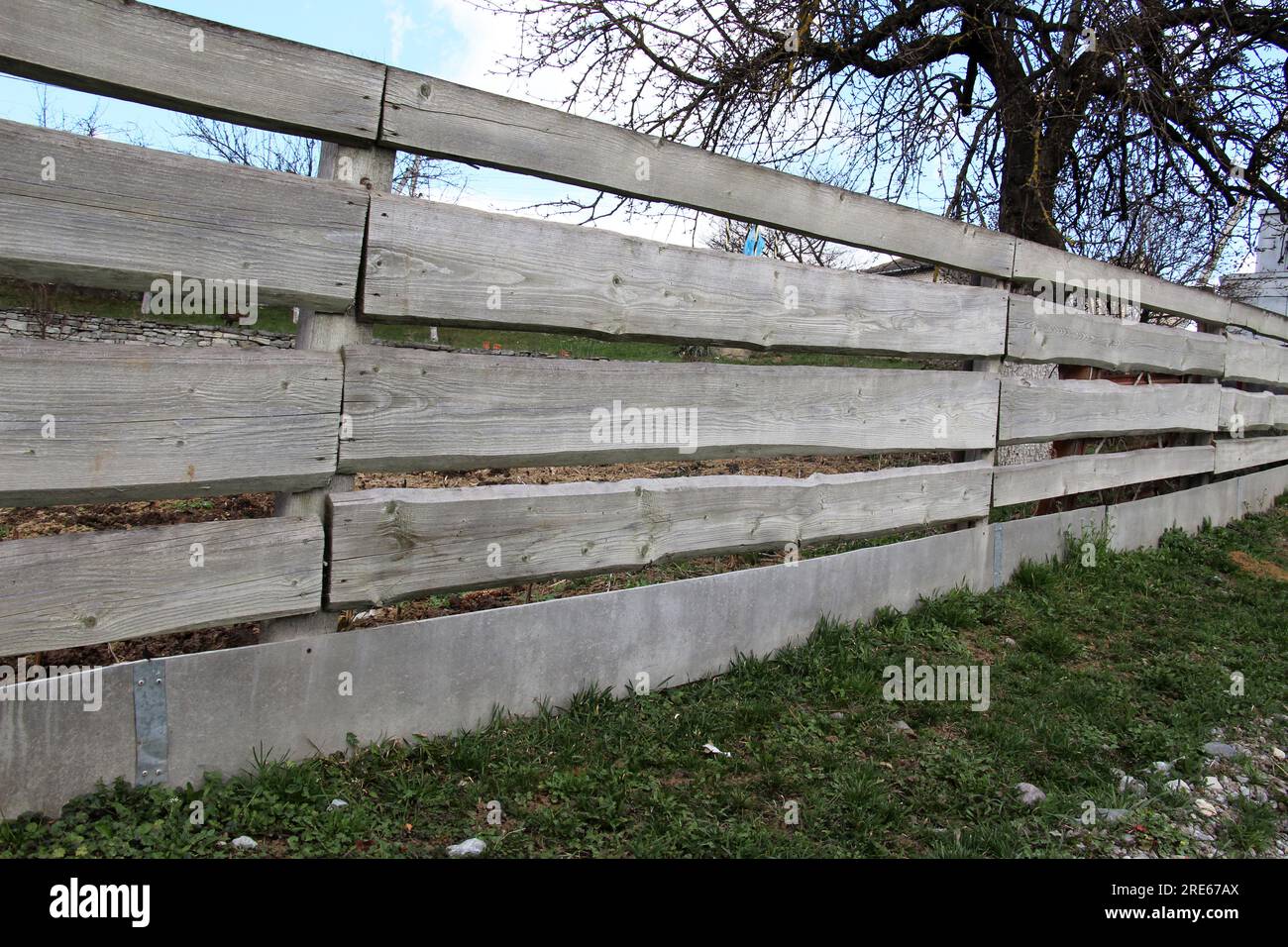 A simple wooden fence is economically beneficial Stock Photo