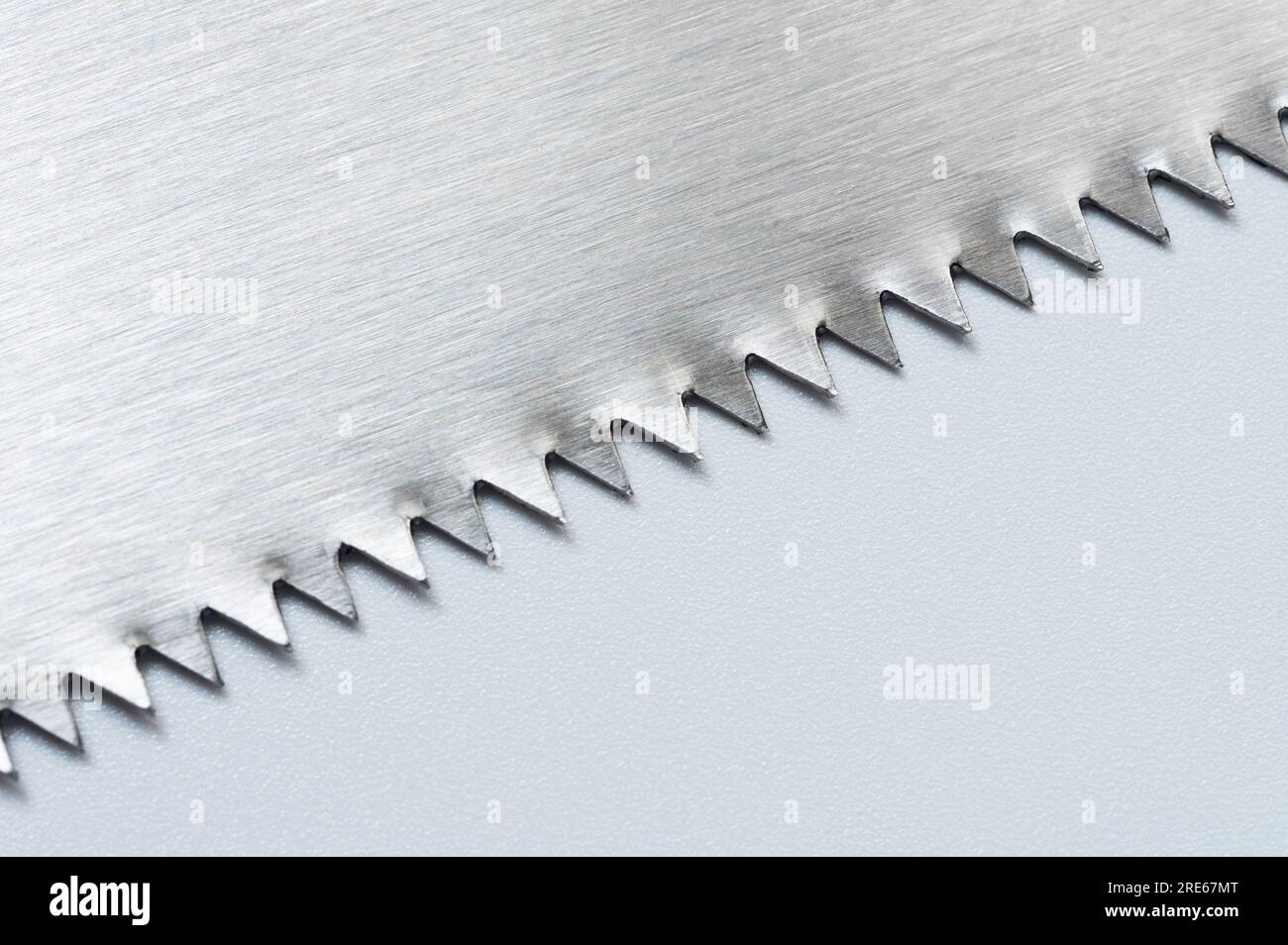 Raw of saw teeth isoated on white studio background close up view Stock Photo