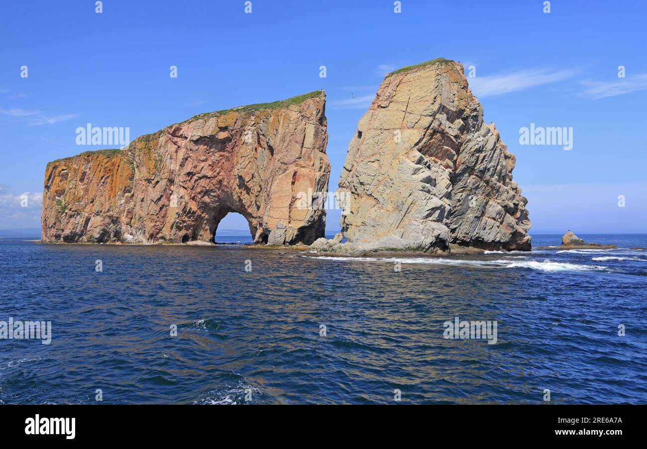 Rocher Perce Rock and Atlantic Ocean on the foreground in Gaspe Peninsula, Quebec, Canada Stock Photo