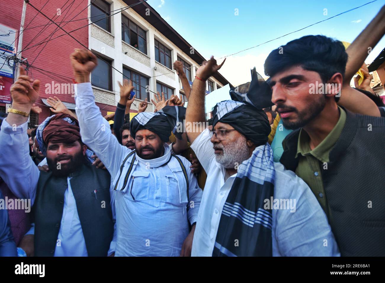 Srinagar, India. 25th July, 2023. Members of the Gujjars and Bakerwals communities shout slogans as they hold placards during a protest in Srinagar, the summer capital of Indian Kashmir, 25 July 2023. Members of the Gujjars and Bakerwals communities were protesting to oppose inclusion of upper caste Paharis in the Schedule Tribe (ST) list. They have threatened to hit the streets along with their cattle if the Indian government fails to withdraw these bills introduced before the Parliament. (Photo by Mubashir Hassan/Pacific Press) Credit: Pacific Press Media Production Corp./Alamy Live News Stock Photo