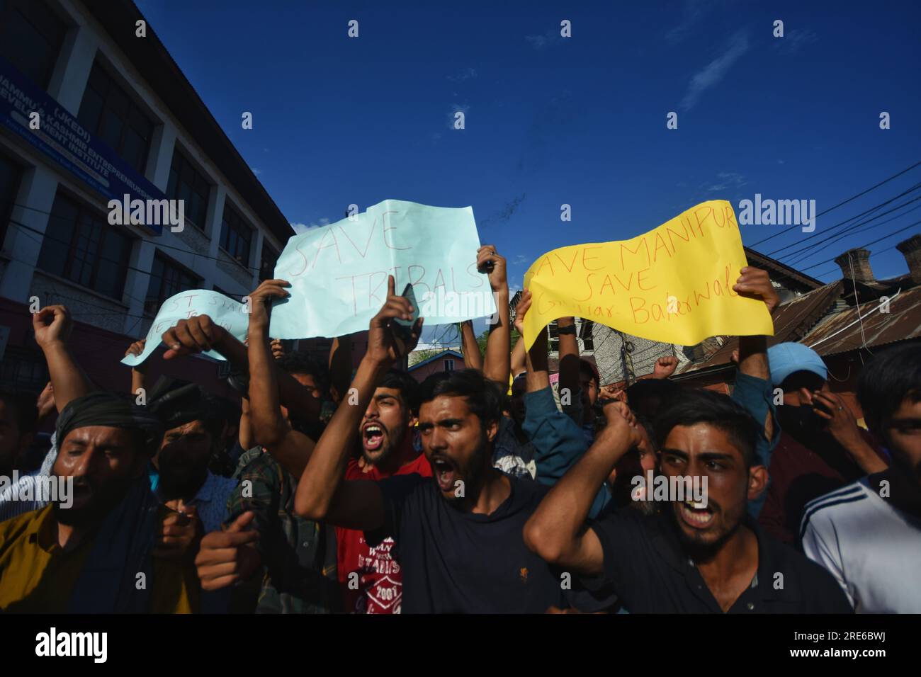 July 25, 2023, Srinagar, Jammu and Kashmir, India: Members of the Gujjars and Bakerwals communities shout slogans as they hold placards during a protest in Srinagar, the summer capital of Indian Kashmir, 25 July 2023. Members of the Gujjars and Bakerwals communities were protesting to oppose inclusion of upper caste Paharis in the Schedule Tribe (ST) list. They have threatened to hit the streets along with their cattle if the Indian government fails to withdraw these bills introduced before the Parliament. (Credit Image: © Mubashir Hassan/Pacific Press via ZUMA Press Wire) EDITORIAL USAGE ONLY Stock Photo