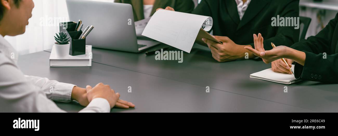 Candidate and interviewers discuss work experience and qualifications