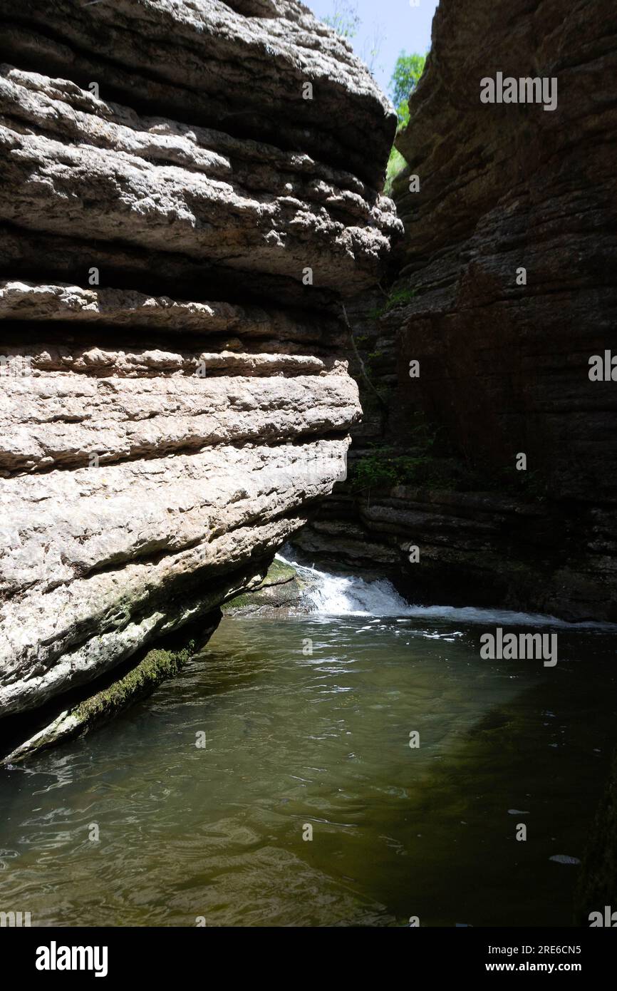 Explore Rosomački Lonci Gorge on Stara Planina, a breathtaking natural phenomenon sculpted by the Rosomača River. Discover cascading waterfalls and un Stock Photo