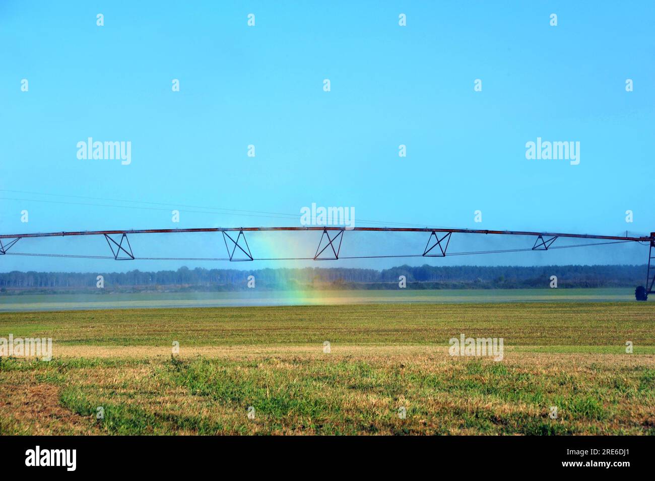 Rainbow forms in irrigation system in field in Southern Arkansas