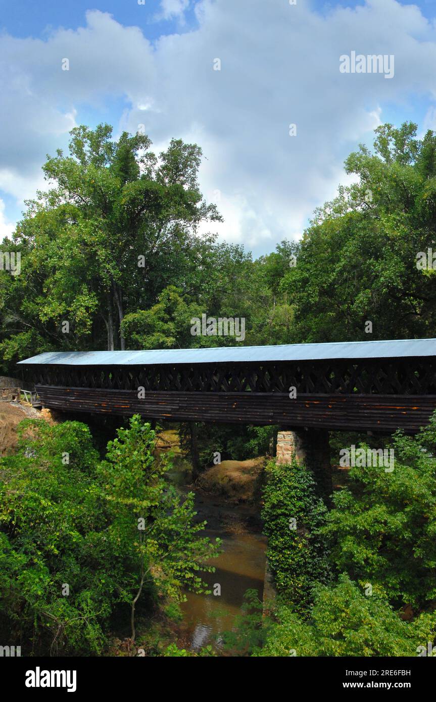Clarkson Covered Bridge in Cullman, Alabama is a long, weathered