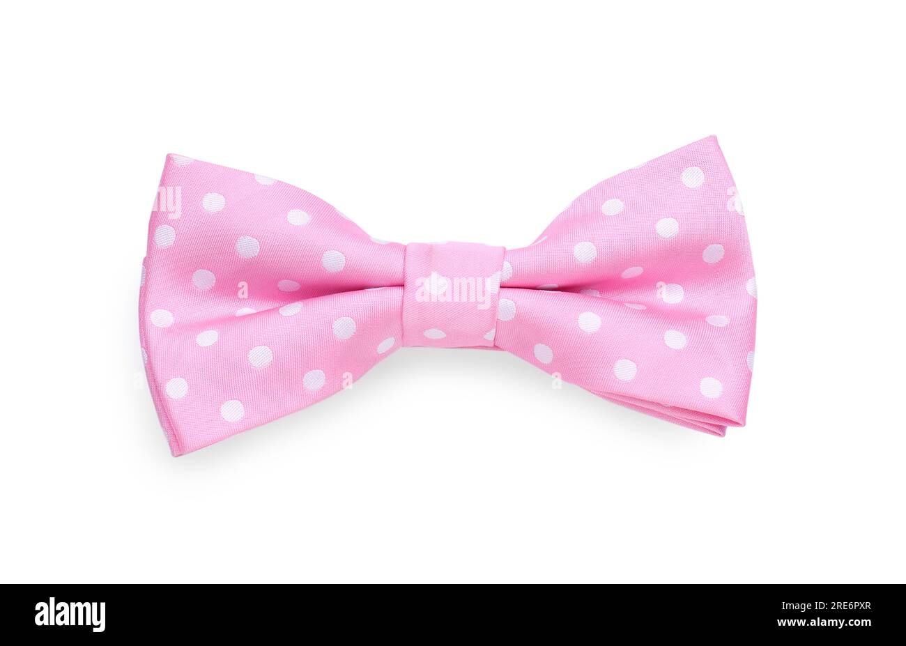 Stylish pink bow tie with polka dot pattern on white background, top view Stock Photo