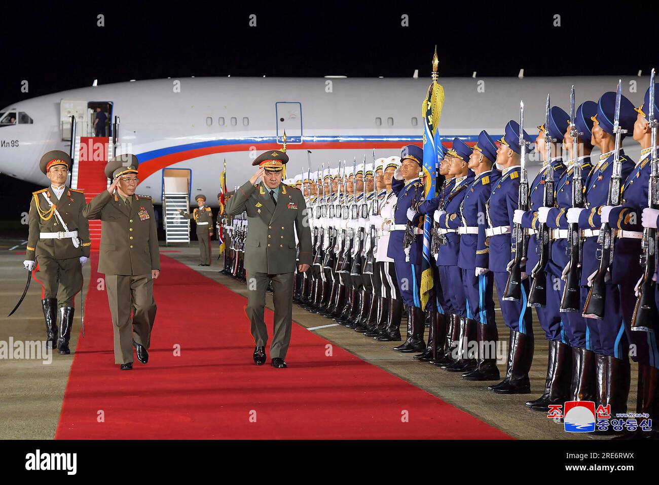 In this photo provided by the North Korean government, Russian Defense  Minister Sergei Shoigu, center, and North Korean Defense Minister Kang Sun  Nam, second left, review the honor guard at the Pyongyang