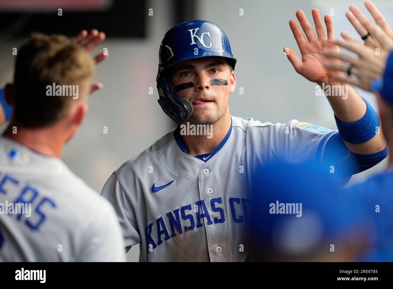 Kansas City Royals' Michael Massey, center, is congratulated in the ...