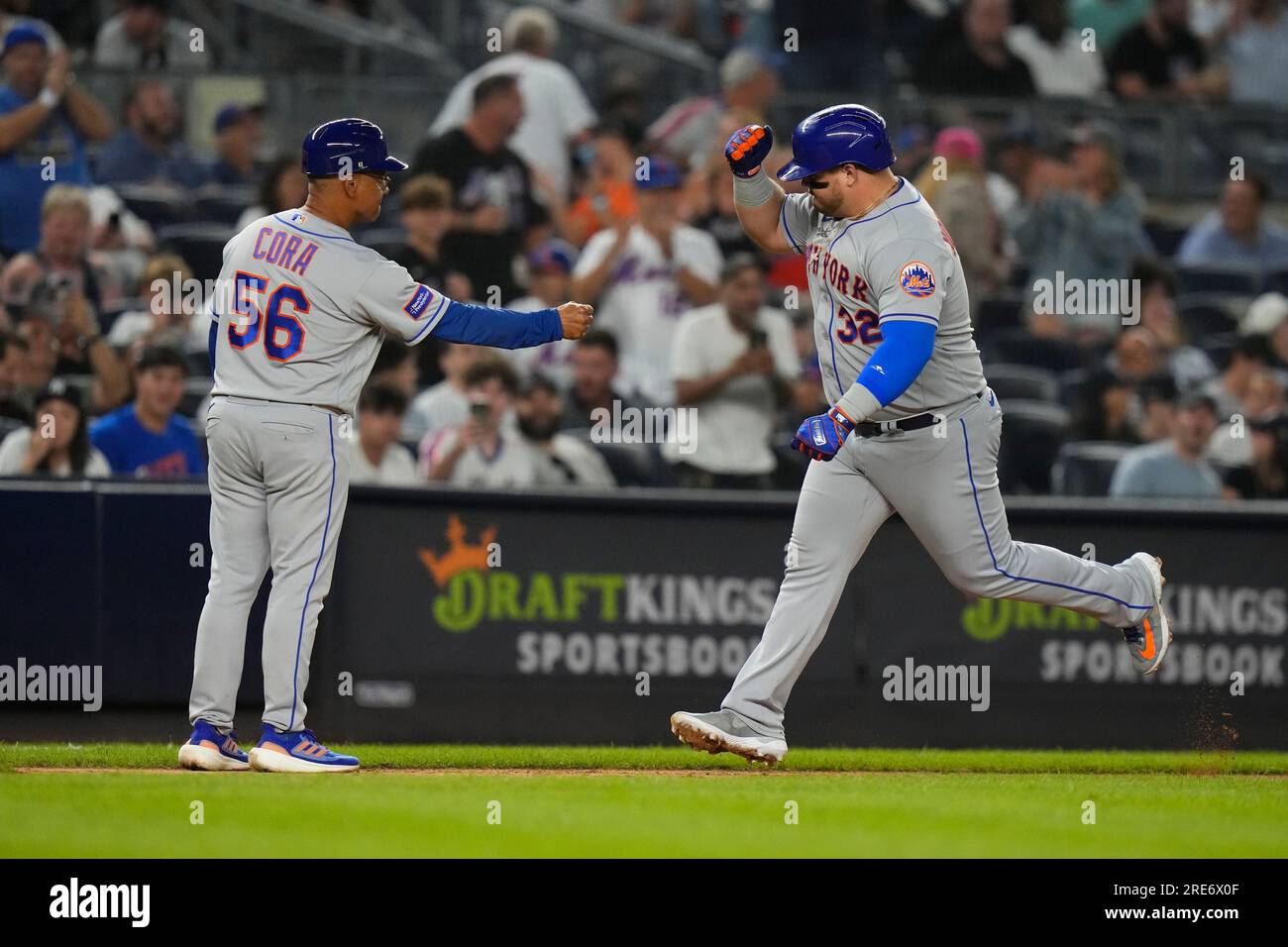 New York Mets' Daniel Vogelbach (32) celebrates with third base coach Joey  Cora (56) after hitting a home run during the sixth inning of a baseball  game against the New York Yankees