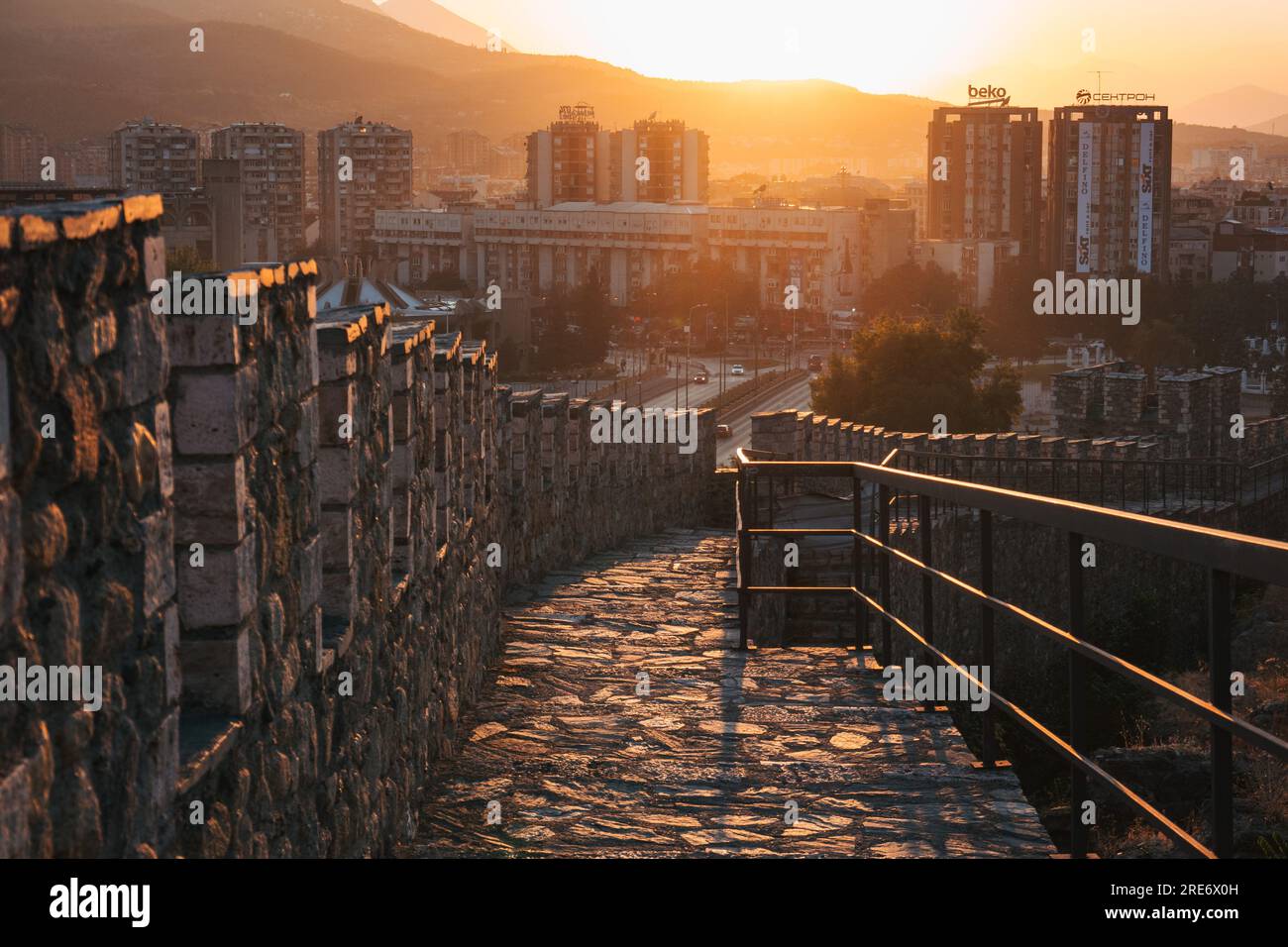Sun sets on stone walls at Kale Fortress, Skopje, North Macedonia. The fort's history dates back to 6th century CE. Stock Photo