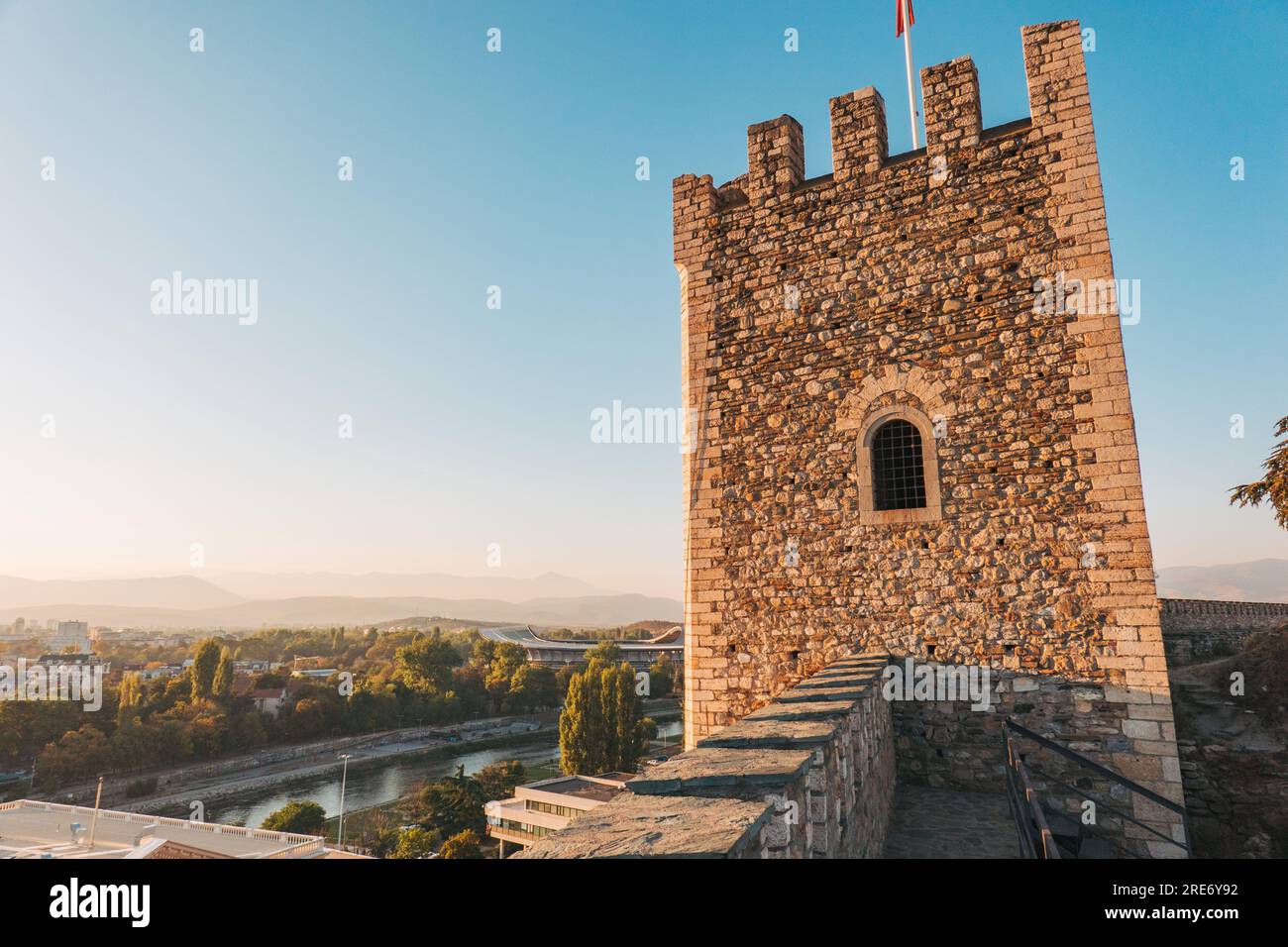 Sun sets on a stone tower at Kale Fortress, Skopje, North Macedonia. The fort's history dates back to 6th century CE. Stock Photo