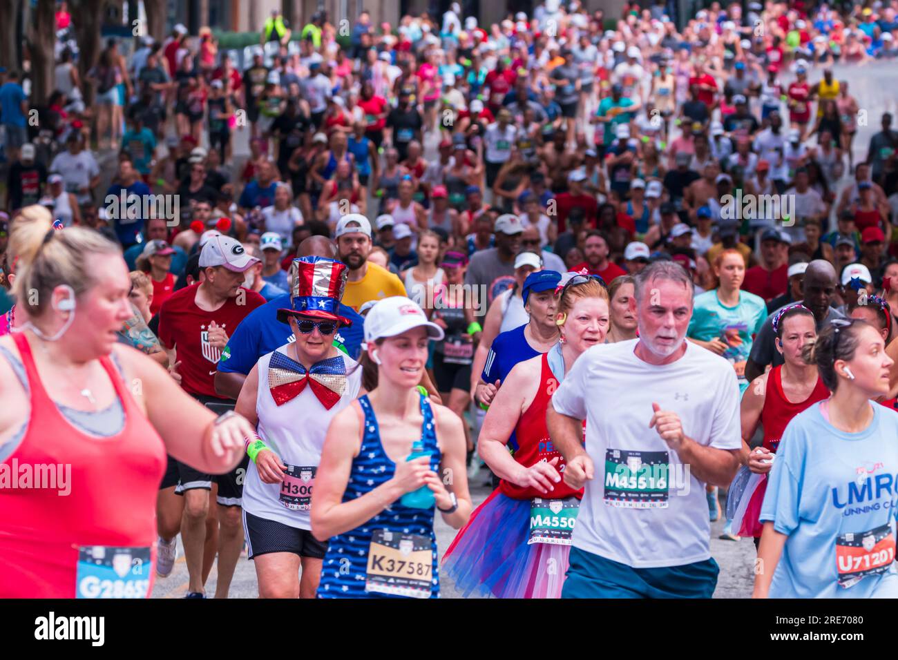 Atlanta, GA / USA - July 4, 2023:  Thousands of runners fill Peachtree Street to capacity in the Peachtree Road Race on July 4, 2023 in Atlanta, GA. Stock Photo