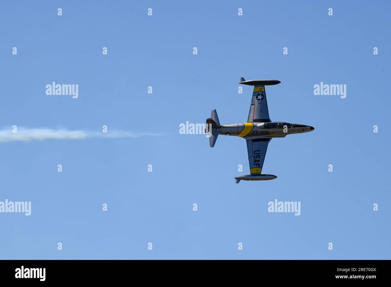 A T-33 Acemaker flies during an aerial demostration at the 2023 Arctic Lightning Airshow on Eielson AFB, Alaska, July 21, 2023. The 2023 Arctic Lightning Airshow included aerial and ground performances celebrating the 50-year anniversary of women in military airpower. (U.S. Air Force photo by Senior Airman Jose Miguel T. Tamondong) Stock Photo