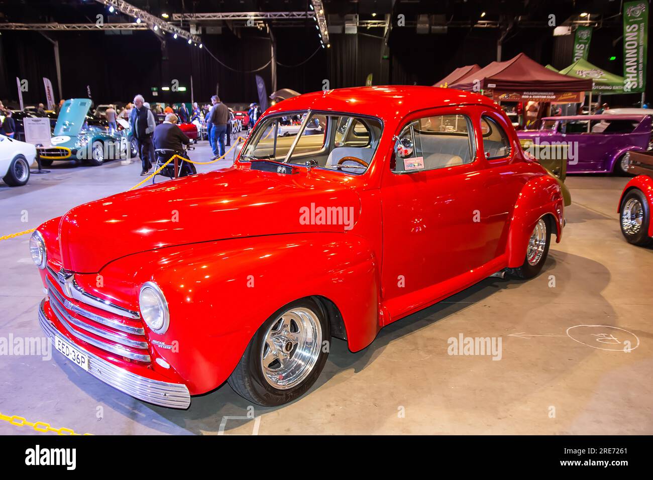 1940s Bright Red Ford De Luxe Two Door Coupe Stock Photo