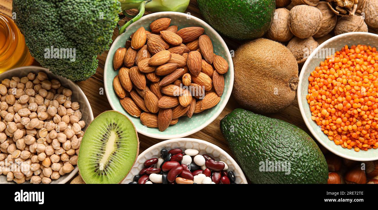 Healthy products rich in vitamin E on table, top view Stock Photo