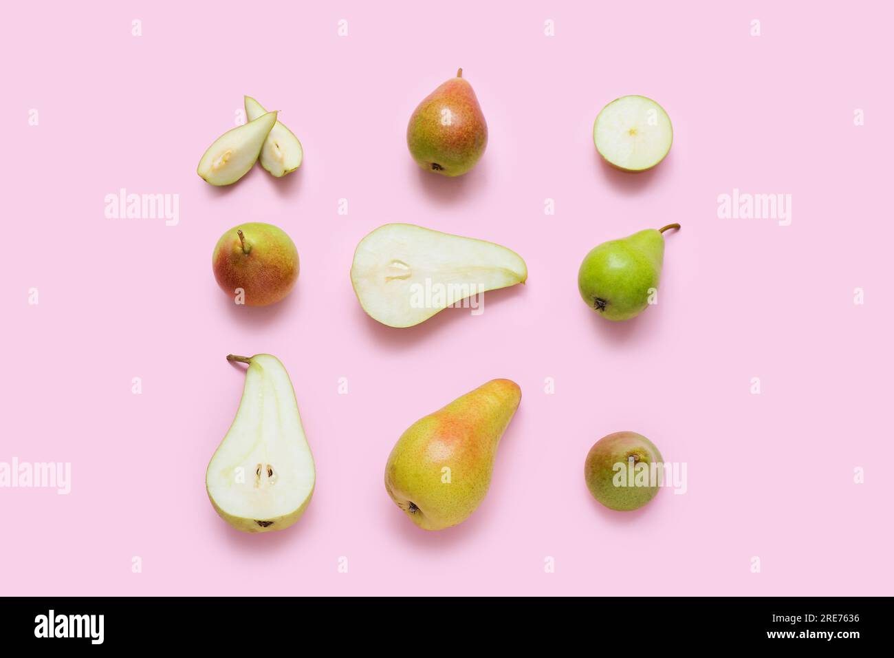 Different types of ripe pears on pink background Stock Photo Alamy