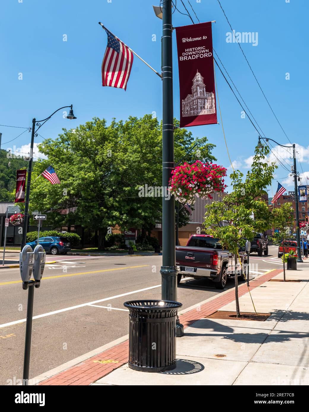 A street scene with a to Historic Bradford sign on a lamp post