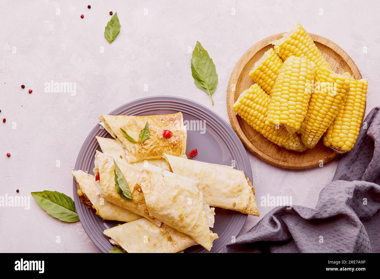 Vietnamese vegetarian egg rolls, cha gio chay and corn on the table