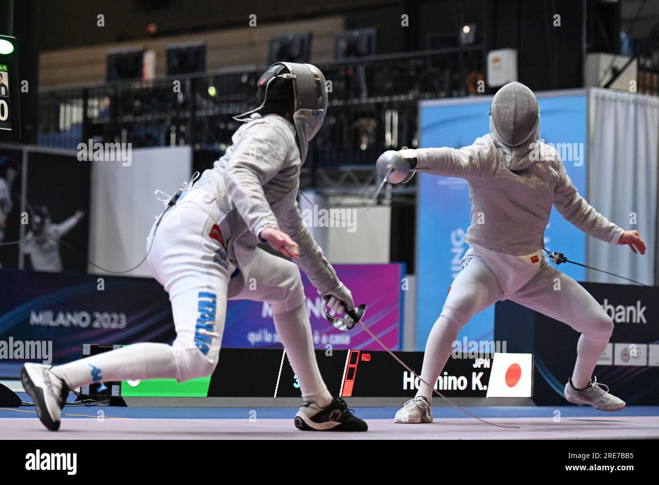 Kento Hoshino of Japan (R) fights against Luca Curatoli of Italy during