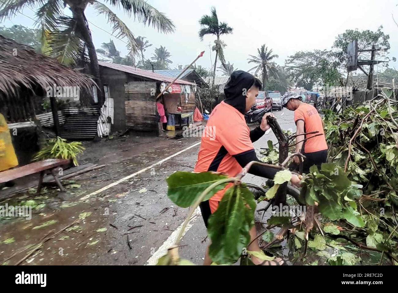 In this photo provided by the Philippine Coast Guard, Coast Guard ...
