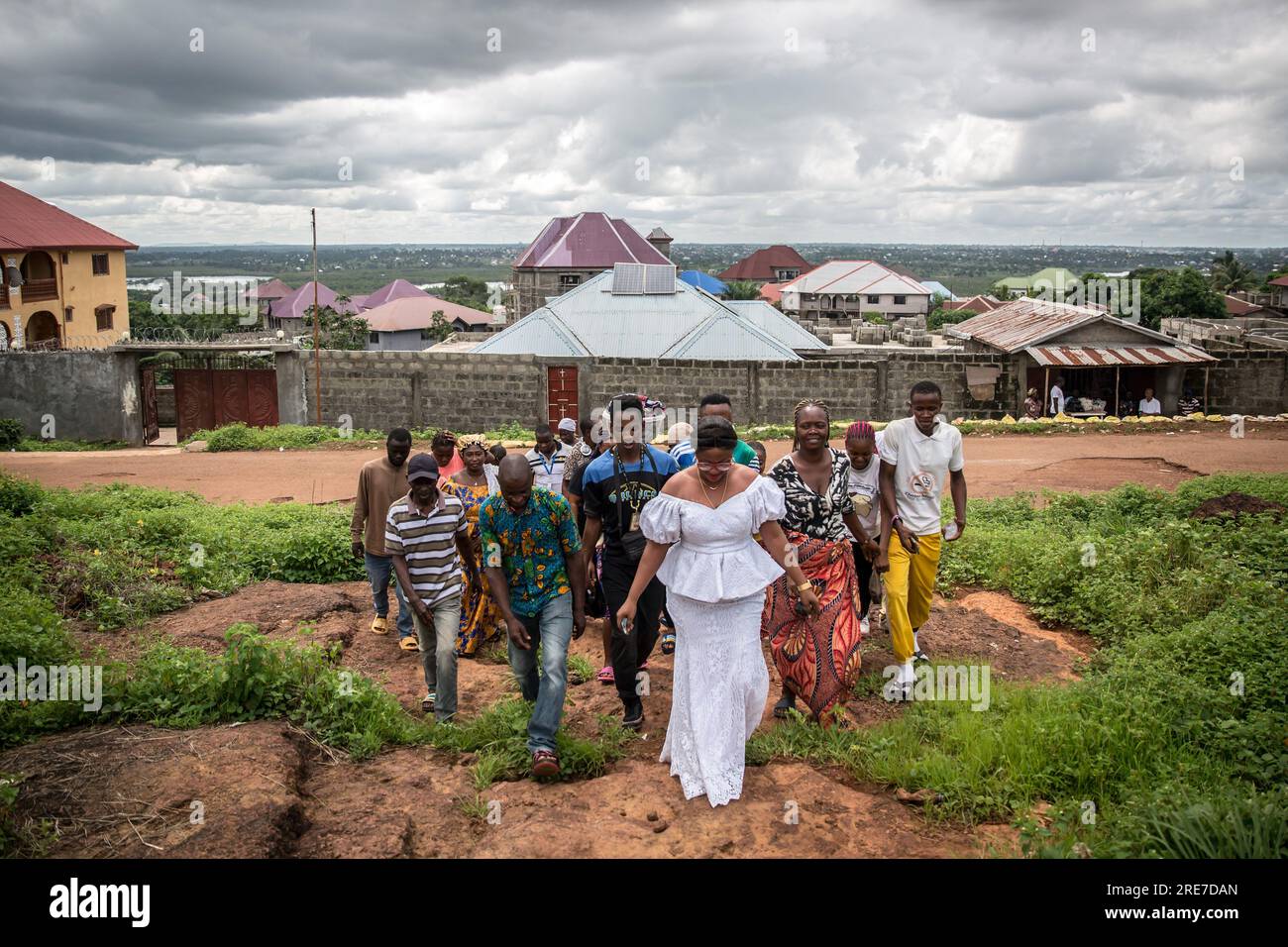 Freetown, Sierra Leone. 25th June, 2023. Marion Kamara, a first-time MP candidate for Freetown's Western Area Rural District, walks to the polling station to vote. For the first time in its 2023 elections, the West African coastal country implemented a quota saying one third of all political candidates must be women. (Photo by Sally Hayden/SOPA Images/Sipa USA) Credit: Sipa USA/Alamy Live News Stock Photo