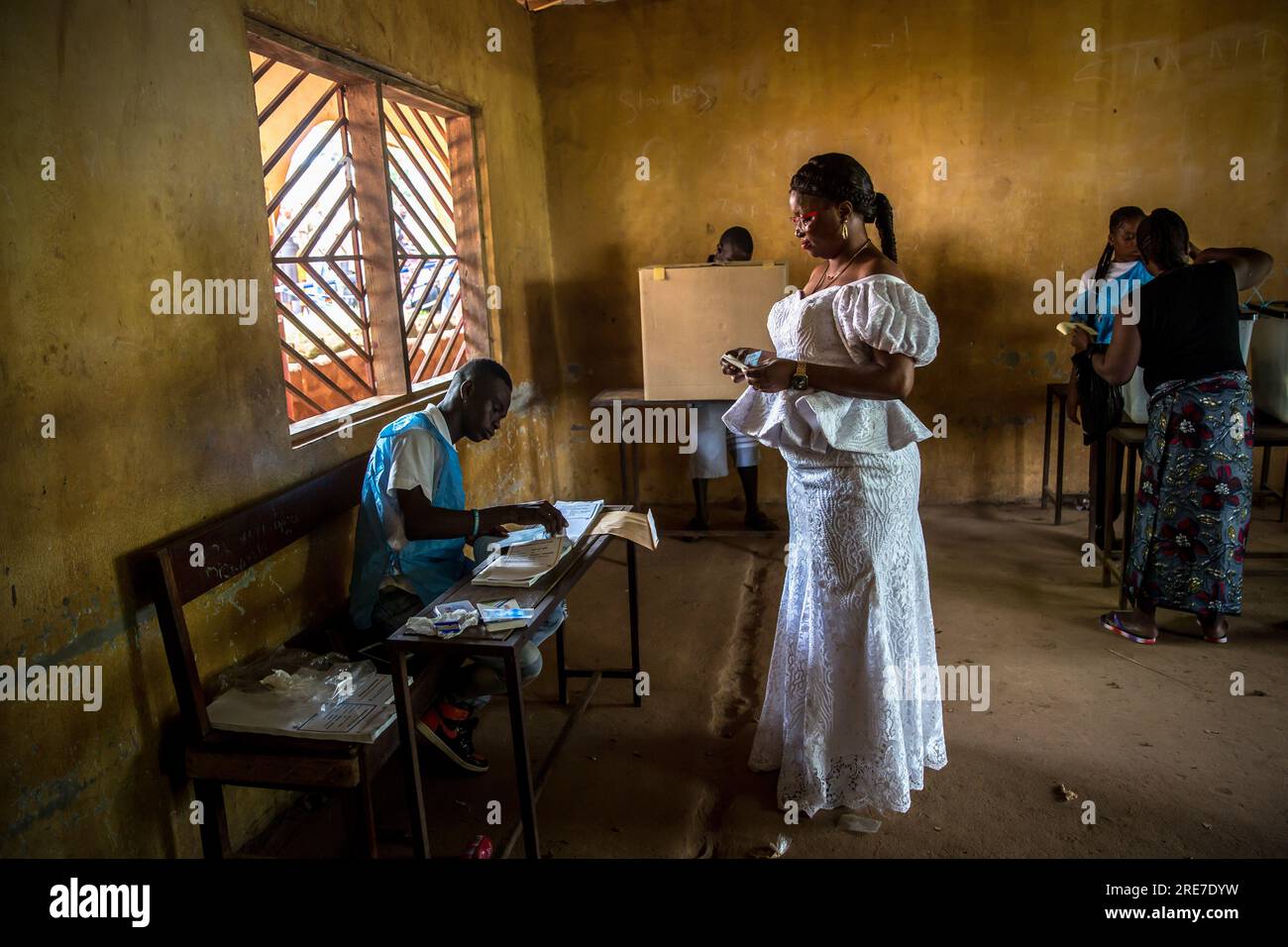 Freetown, Sierra Leone. 25th June, 2023. Marion Kamara, a first-time MP candidate for Freetown's Western Area Rural District, votes for herself in Sierra Leone's 2023 election. For the first time in its 2023 elections, the West African coastal country implemented a quota saying one third of all political candidates must be women. For the first time in its 2023 elections, the West African coastal country implemented a quota saying one-third of all political candidates must be women. (Credit Image: © Sally Hayden/SOPA Images via ZUMA Press Wire) EDITORIAL USAGE ONLY! Not for Commercial USAGE! Stock Photo