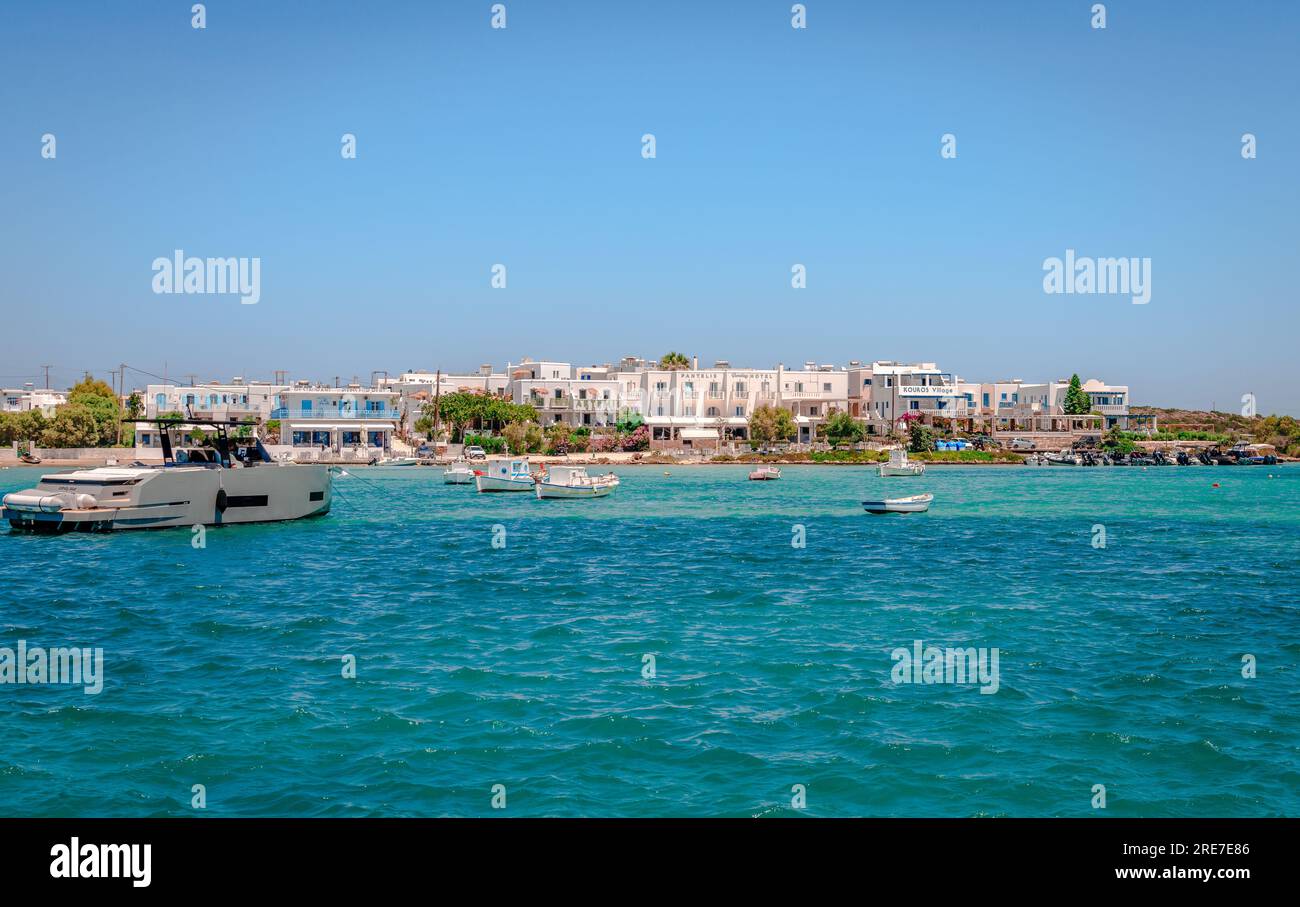 Antiparos, Greece -  June 23 2023: View of the waterfront of from the sea, with whitewashed houses and resorts facing the Aegean Sea. Stock Photo
