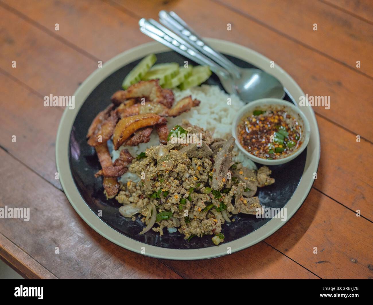 Thai food, spicy minced pork salad (Larb Moo) and Deepfried pork belly
