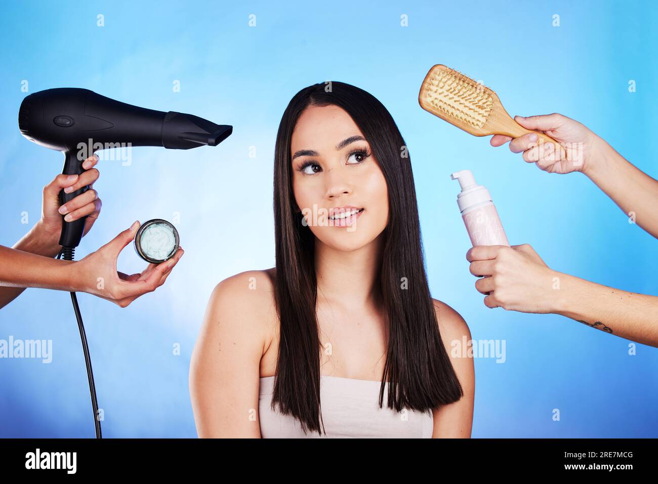 Hair Care Beauty And Tools With A Woman In Studio With A Hairdryer hair-care-beauty-and-tools-with-a-woman-in-studio-with-a-hairdryer