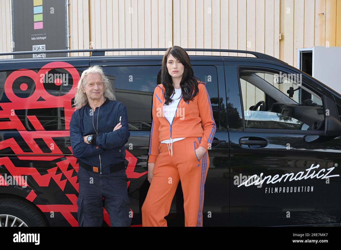 Munich Germany. 25th July 2023. Actor Heinz Wanitschek and actress Gloria Sophie Burkandt stand in front of the original spaceship set from the science fiction thriller Stowaway during the shooting of...