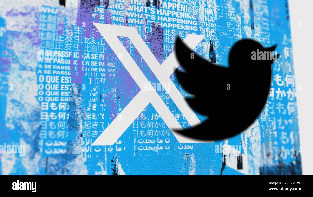 July 26th 2023, the X logo on a the new brand screen, on the foreground the blurry former logo of Twitter. Stock Photo