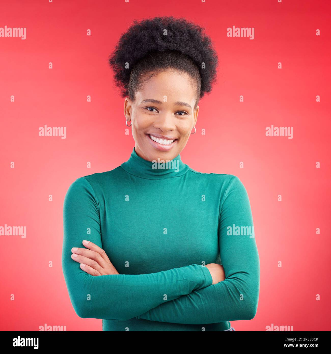 Happy, portrait and a black woman in studio with arms crossed ...